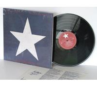 NEIL YOUNG - NEIL YOUNG Hawks and Doves In shrink but opened with tax cut on spine. With inner lyric sleeve.Top copy. US pressing. 1986.