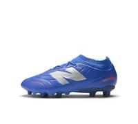 New Balance Garçons Tekela Team Low Laced JNR FG V5 en Bleu/Rouge/Gris, Taille 33