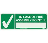 NMC GL315R Panneau d'incendie, légende « In case of fire assembly point is : » avec graphique, longueur 35,6 cm x hauteur 12,7 cm, phosphorescent rigide, jaune sur vert