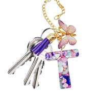 Nybhyjka Breloque en forme de tasse, pendentif en forme de lettre avec papillon et pompon - pendentif tendance et moderne pour sac à dos, bijou pour l'école, le travail, l'extérieur, la randonnée