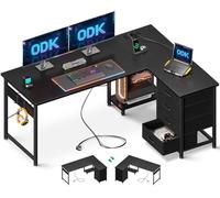 ODK Bureau d'angle avec 4 Tiroirs, 135×100 cm Bureau en L avec Prises de Courant et Ports de Charge USB, Table Angle avec Rangement Réversible pour Travailler et Jouer, Noir
