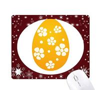 oeufs de pâques ou religion festival jaune tapis de souris en hiver flocon de neige