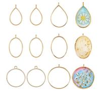 OLYCRAFT 30Pcs Couleur Or Ronde Dos Ouvert Lunette Cadre Rond Pendentifs Lunette Charmes Cadre Dos Ouvert avec 1 Boucle pour la Fabrication de Bijoux Fleur Pressée Bricolage Artisanat 6 Styles