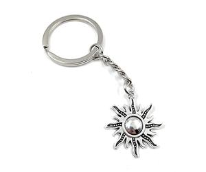 Onwomania Porte-clés Sun Star Porte-clés en métal argenté