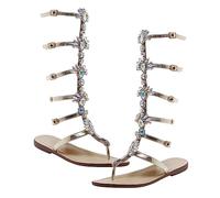 PACKOVE Sandales Plates pour Femmes avec Semelle Confortable et Bride Réglable Sandales Romaines Stylées Dorées pour Plage et Fêtes