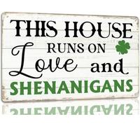 Panneau de la Saint-Patrick « Cette maison fonctionne grâce à l'amour et aux bêtises » - Décoration murale en métal avec trèfle vert porte-bonheur - Décoration pour la maison, la cuisine ou le bureau