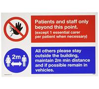 Panneau double avec inscription « Patients and staff only beyond this point All other please stay outside the building »