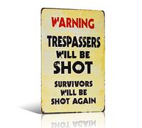 Panneau en tôle « Warning Trespassers Will Be Shot ».