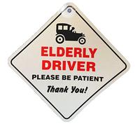 Panneau-ventouse pour la vitre de voiture avec inscription en anglais : « Elderly Driver Please Be Patient » (Le conducteur est une personne âgée, soyez patient s.v.p.)