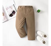 Pantalon de garçon jeune, de couleur unie, confortable et décontracté. Avec un seul bouton décoratif et des poches en biais, design de taille élastique. Convient pour le port quotidien, les voyages, l