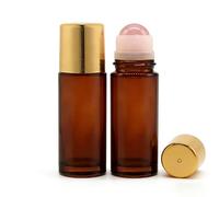 Parfumlism Lot de 2 flacons roll-on de 50 ml en verre ambré avec billes de cristal naturel pour huiles essentielles, flacons déodorants vides rechargeables pour les voyages (quartz rose)