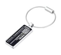 Pendentif bagage TROIKA ANONYMUS avec service Lost and Found, fixation facile sur valises et sacs, dissuade le vol, métal moulé chromé argenté