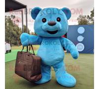 Personnage De Costume De Mascotte Redbrokoly Cyan Teddy Bear Habillé Avec Un Jean Skinny Et Des Sacs Fourre-Tout Multicolore