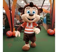 Personnage De Costume De Mascotte Redbrokoly D'acrobate Marron Habillé D'un Maillot De Rugby Et De Boucles D'oreilles Multicolore