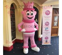 Personnage De Costume De Mascotte Redbrokoly De Château Irlandais Rose Habillé D'un Jean Bootcut Et De Boutons De Manchette Multicolore