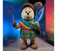 Personnage De Costume De Mascotte Redbrokoly De Cornemuse Habillé Avec Un Maillot De Bain Et Des Mitaines Multicolore