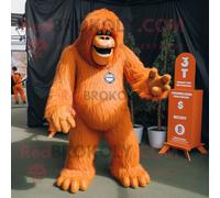Personnage De Costume De Mascotte Redbrokoly De Sasquatch Orange Habillé D'un Combishort Et De Cravates Multicolore
