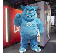 Personnage De Costume De Mascotte Redbrokoly Ogre Bleu Ciel Habillé D'un Coupe-Vent Et De Casquettes Multicolore