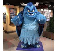 Personnage De Costume De Mascotte Redbrokoly Ogre Bleu Habillé D'un T-Shirt Et D'épingles À Châle Multicolore