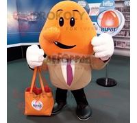 Personnage De Costume De Mascotte Redbrokoly Peach Boxing Glove Habillé D'un Blazer Et De Sacs Fourre-Tout Multicolore