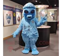 Personnage De Costume De Mascotte Redbrokoly Sky Blue Special Air Service Habillé D'une Combinaison Et D'épingles À Châle Multicolore