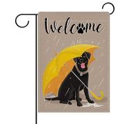 Petit Pavillon Labrador noir, parapluies jaunes, empreintes de pattes et
