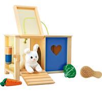 petit pied Lapin en peluche dans un clapier avec accessoires