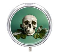 Petit pilulier rond avec fond vert tête de mort et feuilles avec 3 compartiments en métal portable pour médicaments de voyage et vitamines pour sac à main