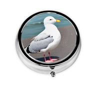 Petite boîte à pharmacie à trois compartiments en forme de mouette mignonne qui peut être placée dans votre poche ou votre sac à main et peut stocker des vitamines.