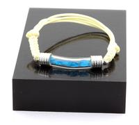 Pierres et Minéraux. Bracelet Apatite bleu neon brut. Couleur beige.