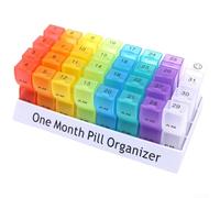 Pilulier mensuel de 31 jours avec deux compartiments AM et PM, 32 sections au total, boîte à médicaments portable en plastique pour une routine de médicaments cohérente (A)