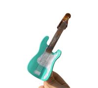 Pince à cheveux nostalgique en acétate avec forme de saxophone qui ajoute de la personnalité à n'importe quelle tenue