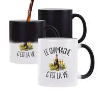 Planetee Mug Magique Le champagne c'est la vie | Tasse Thermosensible, le Motif Apparaît à la Chaleur | Céramique 300 ml Recto Verso | Cadeau Bon Vivant Bonne Vivante Collègue Anniversaire Noël