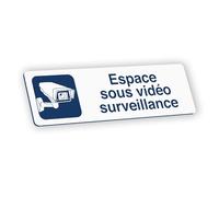 Plaque signalétique gravée autocollante Espace sous vidéo surveillance - blanc écriture bleue - format 12x3,7 cm