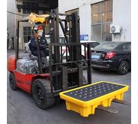Plateforme de rétention des déversements d'hydrocarbures industriels - Bac utilitaire discret avec drain et accès pour chariot élévateur pour une maîtrise et un nettoyage efficaces des déver