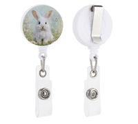 Porte-badge rétractable blanc avec motif lapin de Pâques assis dans l'herbe et marguerites pour médecin, infirmière, étudiant, employé de bureau