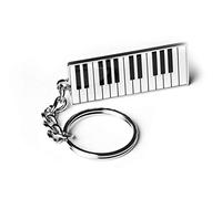 Porte-clés clavier de piano en métal argenté et résine robuste présenté dans une pochette cadeau de luxe