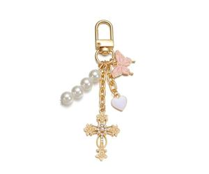 Porte-clés croix chrétienne dorée avec perles, cœur et papillon, porte-clé sac à main et voiture, bag charm élégant pour femme, breloque décorative cadeau communion, anniversaire ou fête religieuse