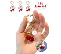 Porte-clés de haute qualité à la mode et mignon en forme de cerise et de papillon doré - Porte-clés cerise, pendentif de sac à dos élégant, pendentif de lettre de l'alphabet A à Z en alliage, pendenti