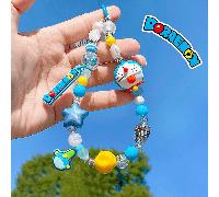 Porte-clés de téléphone brillant de la série Doraemon - Édition bleue, adorable figurine Doraemon avec perles et étoiles colorées, accessoire de dessin animé mignon pour la décoration de téléphone, ca