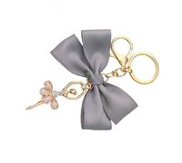 Porte-clés élégant sur le thème du ballet, avec breloque délicate de danseuse et accents de, idéal pour les accessoires, joli porte-clés