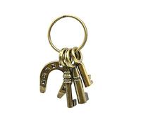 Porte-clés original et porte-bonheur avec un fer à cheval, un hibou, une main de Fatima, un trèfle porte-bonheur, de l'or. Clés de maison ou de voiture, mauvais œil, clés originales.