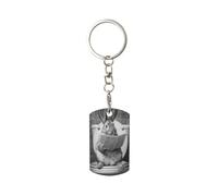 Porte-clés rectangulaire en métal plaqué lapin avec journal sur siège de toilette pour homme et femme