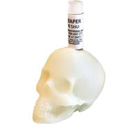 Poudre Carolina Reaper avec 2 200 000 SHU 2,5 g dans une tête de mort phosphorescente qui brille dans l'obscurité.