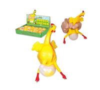 Poule en caoutchouc pondant un œuf