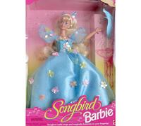 Poup?e Barbie Songbird de Mattel avec un v?ritable oiseau chanteur en ?quilibre sur son doigt