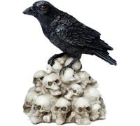 Puckator – Figurine – Corbeau debout sur crânes empilés