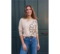 Pull à col roulé et broderies