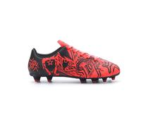 PUMA Tacto Christian Pulisic Firm Chaussures de football artificielles unisexes pour enfant, Rouge-noir Ah25, 12 Big Kid