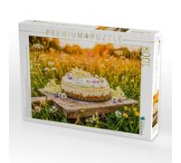 Puzzle · Baisekäsetorte in blühender Sommerwiese ALS zartes idyllisches | Puzzlemotiv · Ein sommerliches Dessertmotiv mit Baiser und… · 1000 pièces · Format assemblé 64 × 48 cm · CALVENDO Puzzle